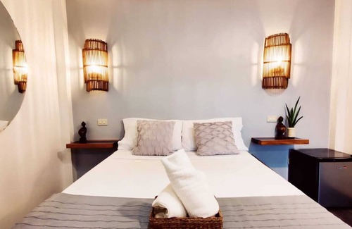 Barangay Buena Suerte Apartment | Cozy room with Private Rooftop Deck in El nido town