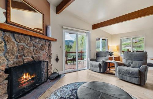 Vail House | Cozy Secluded Riverfront Cabin Fireplace Parking
