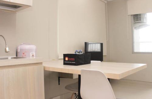 Duren Sawit Apartment | Cozy Studio at Gateway Park LRT City Jatibening Apartment By Travelio