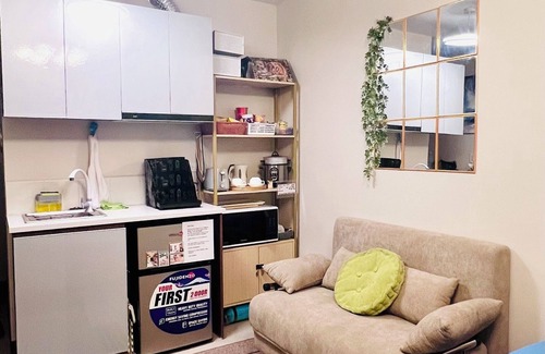 Lapu-Lapu Condo | Cozy Studio with Balcony in Cebu Near Mactan Airport Pool Parking wiFi & More