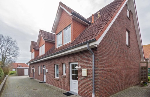 Dornumersiel House | Cozy terraced house Antje with terrace and small garden