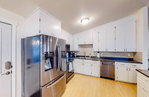 Pierce County House | Cozy tree-lined home with patio, grill, washer/dryer, and internet - near hiking