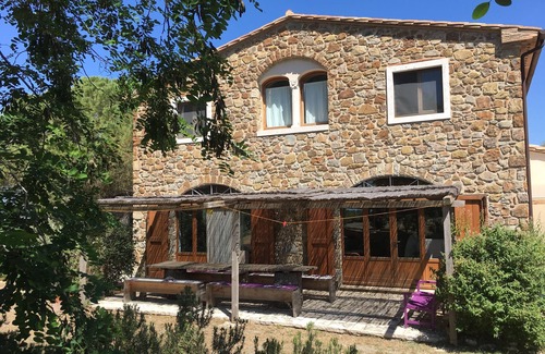 Manciano House | Cozy tuscan casale in stone and wood on a top of hill covered with olive trees