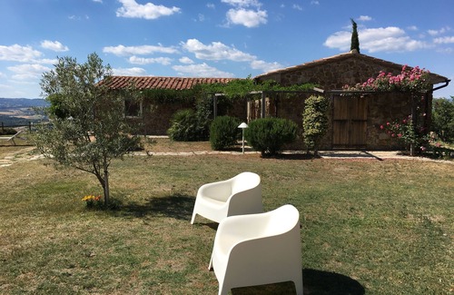 Manciano House | Cozy tuscan casale in stone and wood on a top of hill covered with olive trees