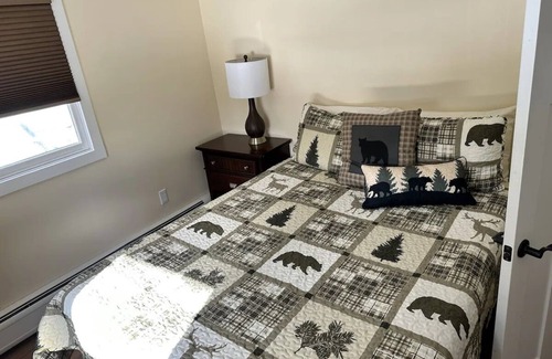 Schroon Lake Hotel | Cozy two bedroom suite with 2 queen beds and a twin.