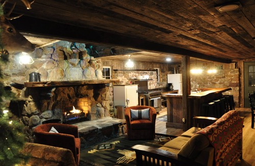 Cleveland Cabin | Cozy up in this rustic Stone Lodge and relax by the fireplace