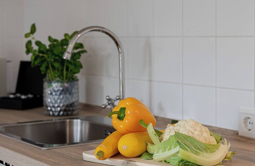 Tinnum Apartment | Cozy vacation happiness with garden view and south-facing terrace.