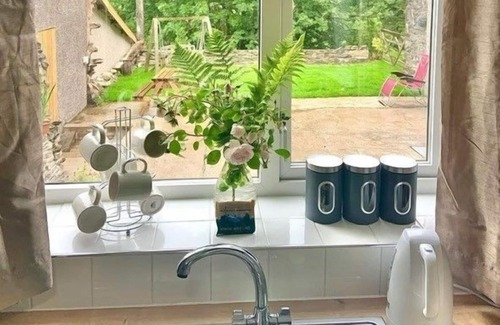 Cockermouth Cottage | Crag End Fern Cottage, sleeps 2 guests in 1 bedroom with walking over the Lorton Fells from the doo