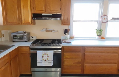 Jamestown House | Creek Side Cottage with Lake Views, Lake Access, Dock and Secluded Yard