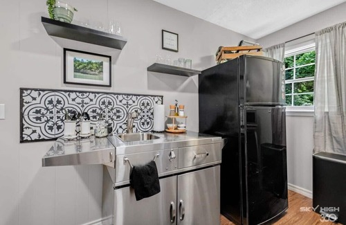 Rogers Cottage | Creekside Oasis - 5BR Retreat with Pool & Hot Tub