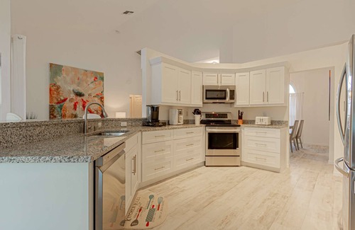 Crown Pointe House | Crown Pointe- Upscale lake view, pool home (w/2 king bedrooms) minutes to downtown & beaches