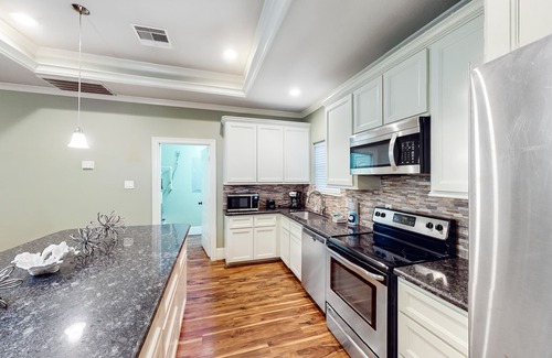 Pointe San Luis House | Custom-Built Home w/Deck, W/D, WiFi & Shared Pool - Steps to Beach, 2 Dogs OK