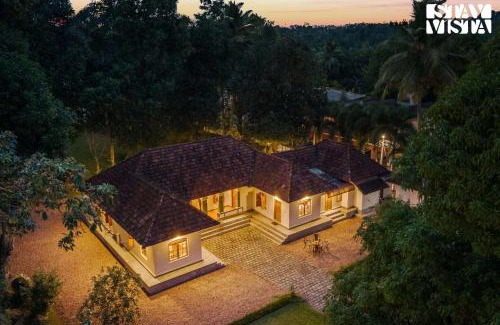 Tiruvalla Villa | CVM House with Lawn at Thiruvalla by StayVista