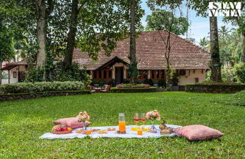 Tiruvalla Villa | CVM House with Lawn at Thiruvalla by StayVista