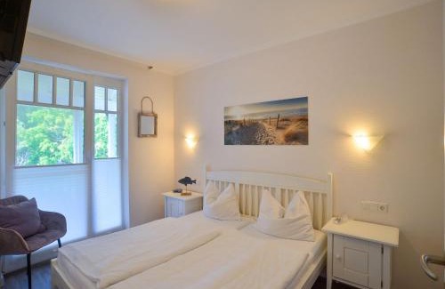 Binz Apartment | Dünenpark Binz - Komfortplus Ferienwohnung mit 2 Schlafzimmern und Balkon im Obergeschoss 005