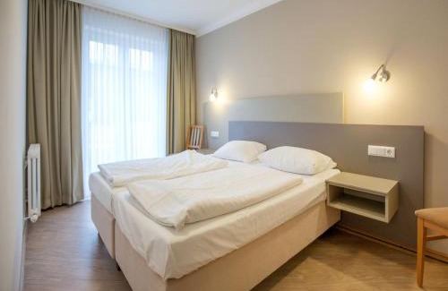 Binz Apartment | Dünenpark Binz - Komfortplus Ferienwohnung mit 1 Schlafzimmer und Terrasse im Erdgeschoss 063