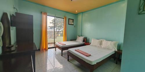 Puerto Princesa City Centre Bed & Breakfast | Dads Bayview Pension
