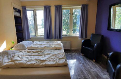 Municipality of Steenwijkerland House | De Opkikker 10 persoons vakantiehuis met hottub