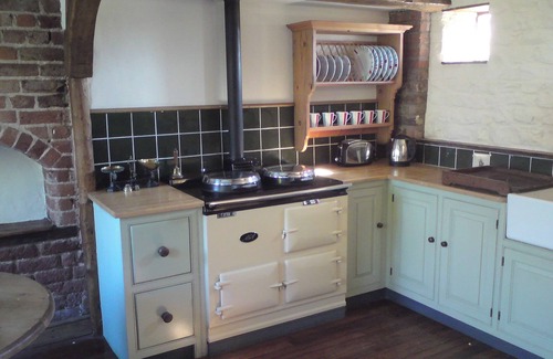 Buckton Cottage | Deceptively spacious and cosy cottage with enclosed gardens and hot tub.