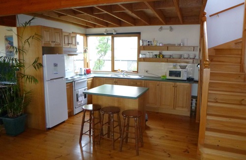 St. Andrews Beach House | Decks with views, fireplace and playground. all only a short walk to beach.