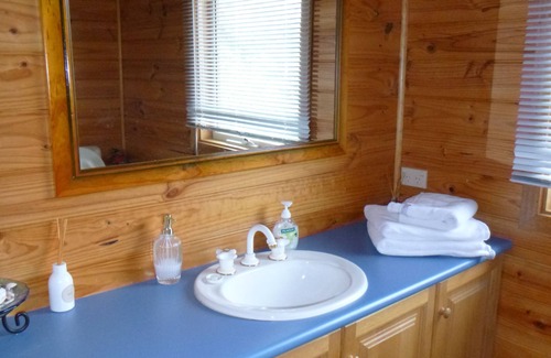 St. Andrews Beach House | Decks with views, fireplace and playground. all only a short walk to beach.