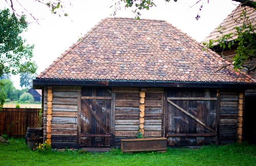 Pauleni-Ciuc House | Delightful 3+1 room barn with indoor fireplace and activity garden.