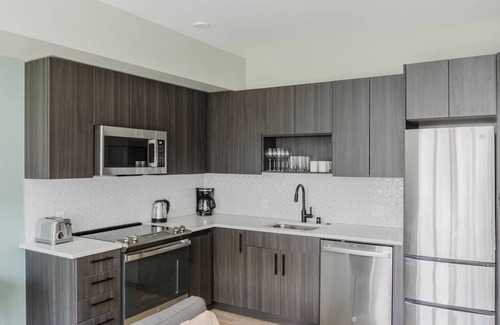 Squire Park Apartment | Delightful First Hill Jr 1BR w/Bike Storage, Gym & W/D, by Blueground