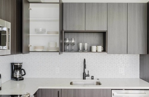 Squire Park Apartment | Delightful First Hill Jr 1BR w/Bike Storage, Gym & W/D, by Blueground