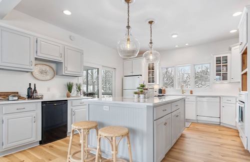 Macatawa House | Delightful Private Wooded Setting Stunning Harbor Views, Private Beach Access, Tennis