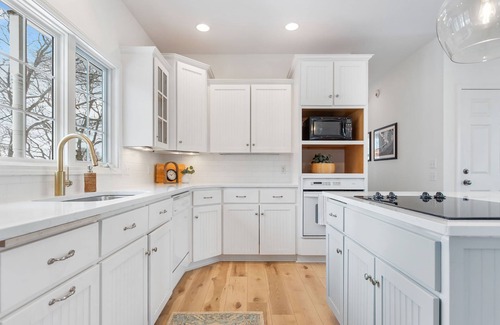 Macatawa House | Delightful Private Wooded Setting Stunning Harbor Views, Private Beach Access, Tennis