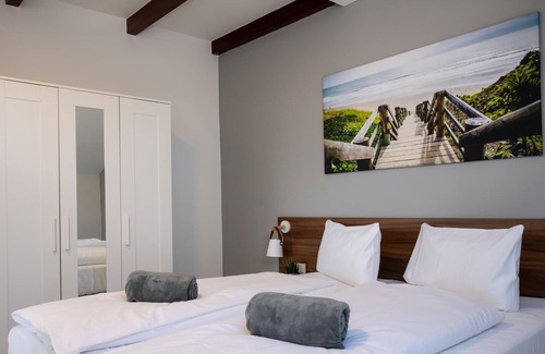 Bosen Apartment | Deluxe Apartment Plus - JUNIPRO Apartments