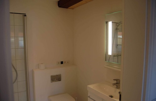 Grasten Apartment | Deluxe Apartment with Fireplace and Sea View