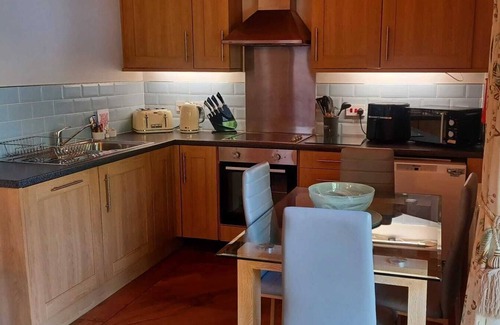 Little Stukeley Apartment | Deluxe Lodge with a Lake View and Hot Tub