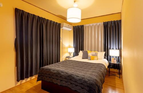 Kadena-cho House | Deluxe Room 130平米 URUMAHOTEL