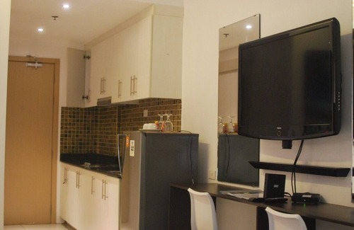 Barangay 76 Condo | Deluxe Twin Suite Bed