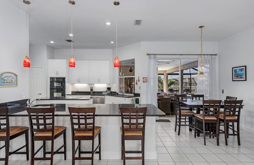Pelican Villa | Deluxe villa, southwest facing, heated pool & spa, large corner lot, Gulf access