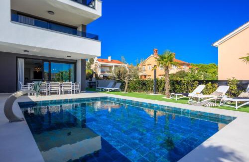 Krk Villa | Deluxe villa with heated pool, whirpool, sea view, beautiful beach IV - by Traveler tourist agency Krk ID 2403