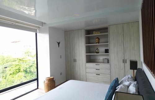 Luis Donaldo Colosio Apartment | Departamento 5ta Av - Cerca de la playa con Rooftop Pool & Cancha de Padel
