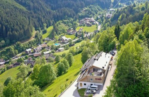 Zell am See Apartment | der Sonnberg Alpinlodges - Apartments mit Seeblick, privater Sauna und Self Check-In