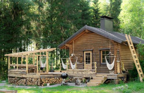 Kuortti Ski Chalet | Design Cabin with Jacuzzi, Sauna & Nature