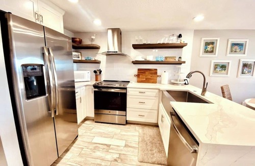 Butler Beach Condo | Direct Beachfront Location! Updated, Well Appointed Open Concept Design! Pool!