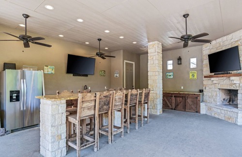 Concan House | Directly ON the Frio River, private golf cart/walking path, hot tub, swimming pool, 3 master suites