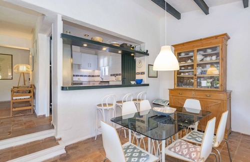Binisafua Villa | Discover Es Cantell, a villa steps from the beach and dining!