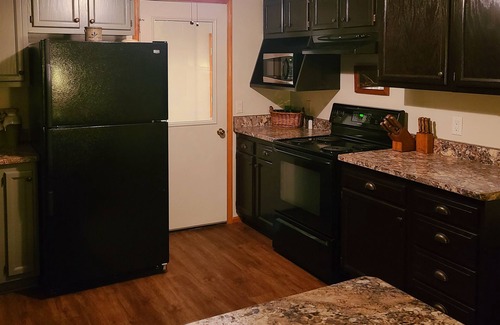 Knoxville House | Discover Ms. Becky's Bungalow, single level home in Marion County, Iowa!
