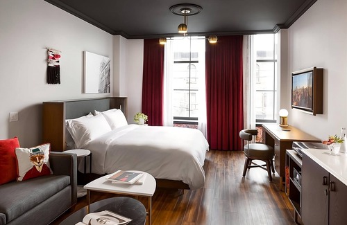 Riverside Hotel | Dive Into Your Dream Vacation! Prime East End Location, Rooftop Bar, Restaurant