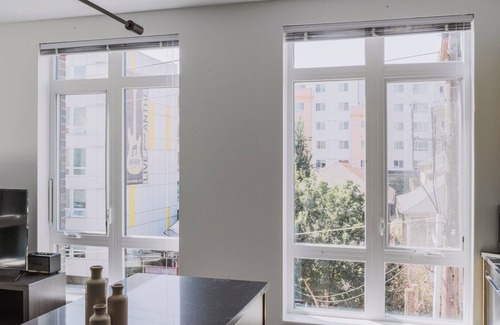 Squire Park Apartment | Divine First Hill 1BR w/Fitness Center & W/D, by Blueground