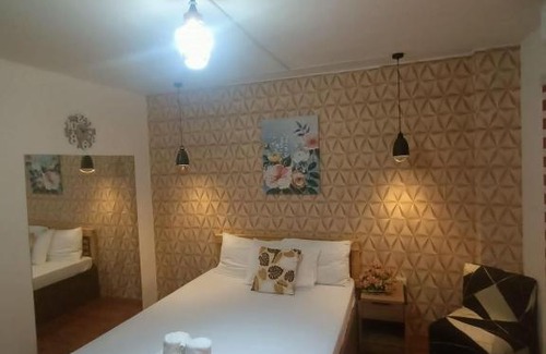 Cabanatuan Apartment | DJCI Apartelle with own kitchen and bath rm212