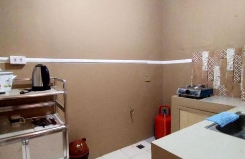 Cabanatuan Apartment | DJCI Apartelle with own kitchen and bath rm212