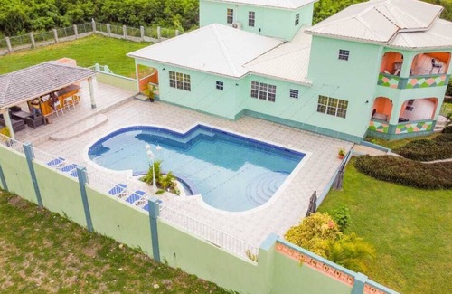 Saint Peter Parish Apartment | Docs Paradise.A unique blend of privacy, comfort, and a touch of tropical charm.