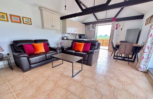 Dilham House | Dog and family friendly barn conversion with fully enclosed garden and hot tub